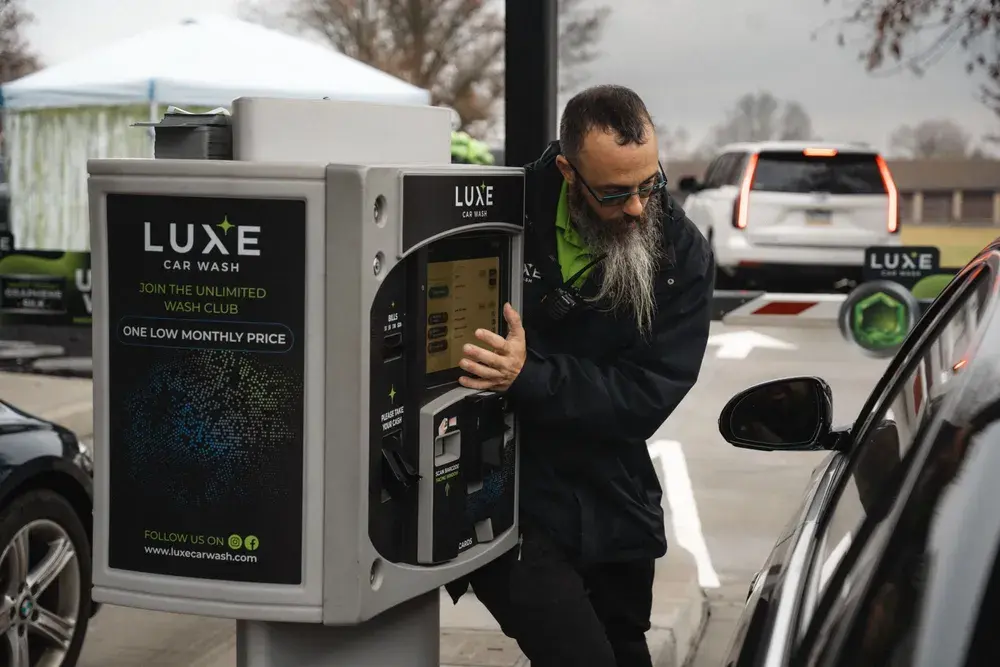 A Luxe attendant at the pay station